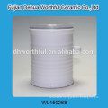 Blue ceramic tea canister with plastic cover